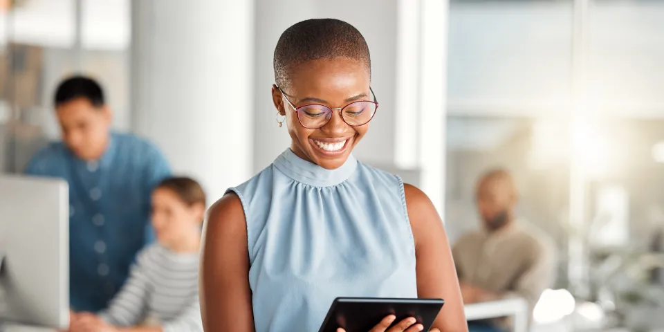 Happy, business woman and tablet