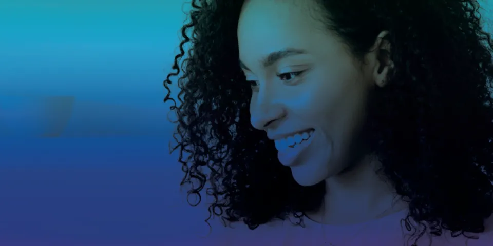 smiling woman with gradient background
